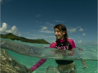 Girl Plays With Sting Rays, Photos courtesy of Tahiti Tourisme