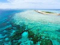 Aerial view of deserted tropical island on coral reef,  tororo reaction