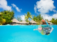 Woman snorkeling, BlueOrange Studio